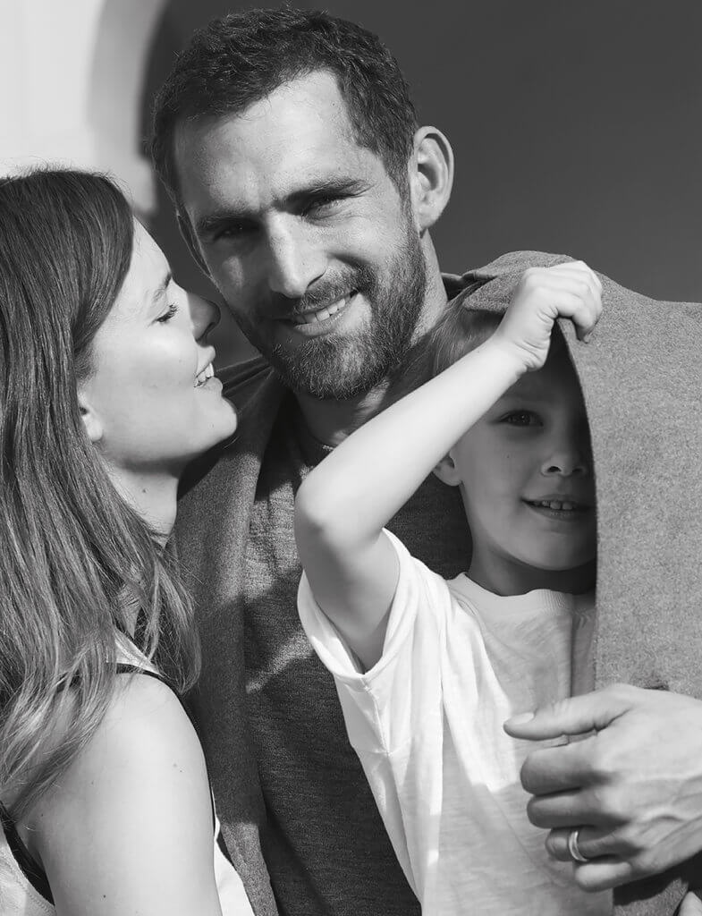 Picture of model will chalker and his family in black and white for Acqua di Parma. Natural beauty