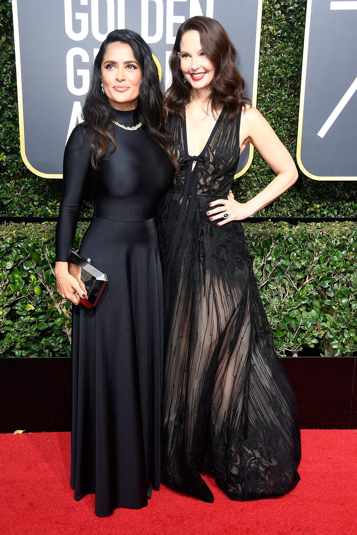 The Golden Globes awards Salma Hayek holding Tyler Ellis clutch