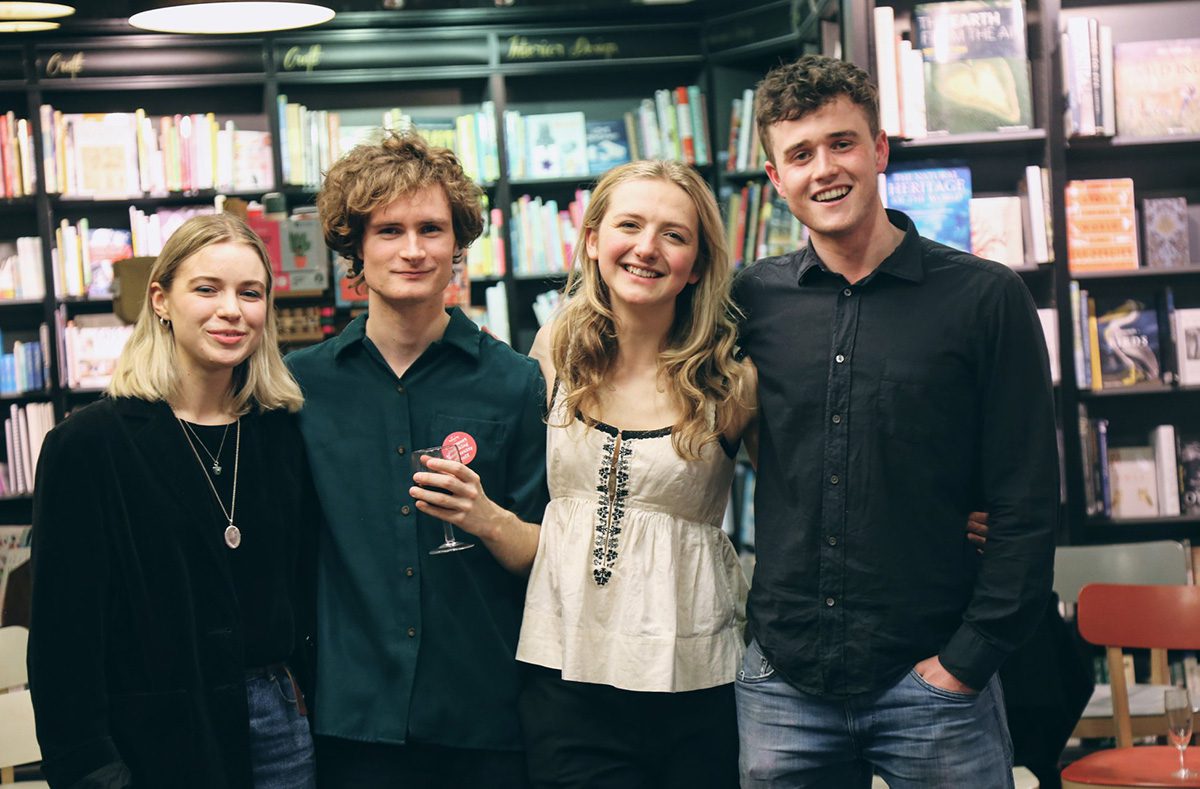 Oxford student magazine editors pose for photo in waterstones bookshop