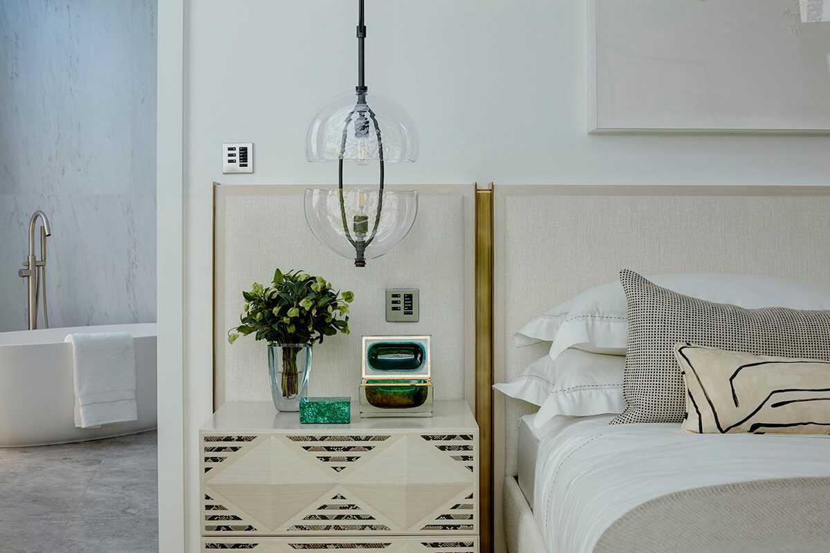 contemporary style bedroom with bathtub in the background