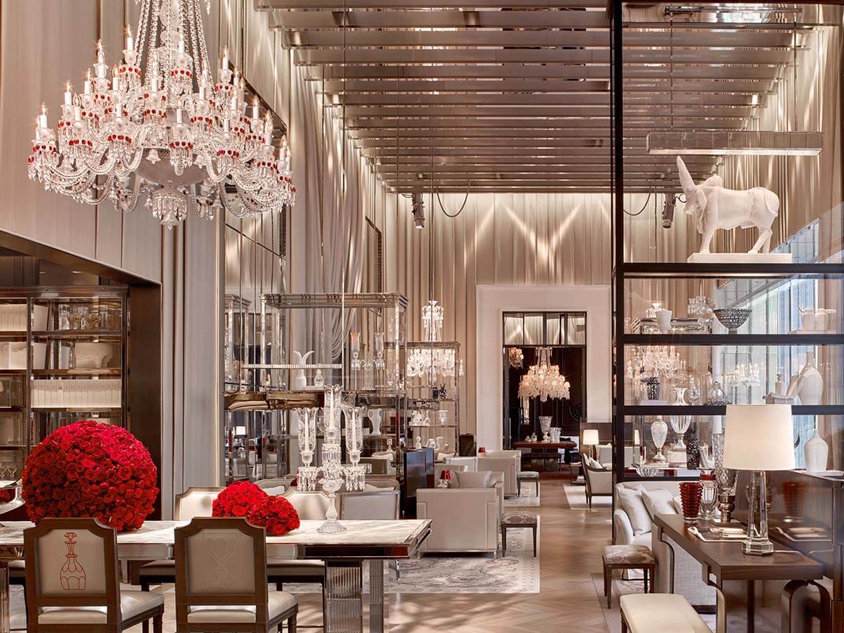 Luxury hotel lobby area with contemporary decorations and chandeliers
