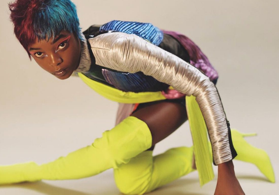Model poses in futuristic make-up and styling