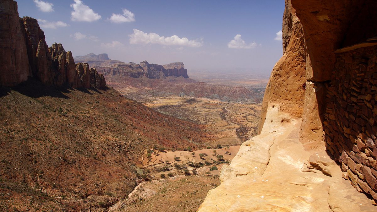 Dry valley with large cliffs