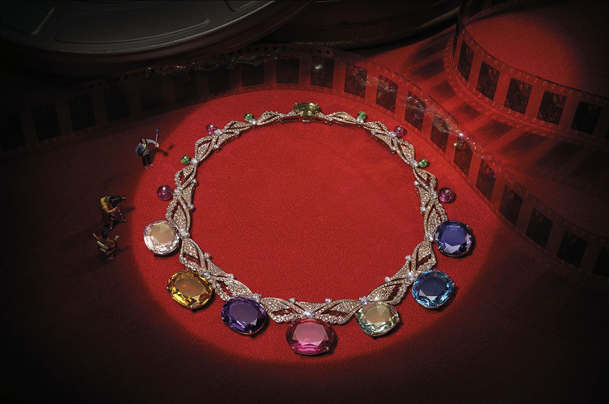 Still life image of a diamond necklace on a red carpet 