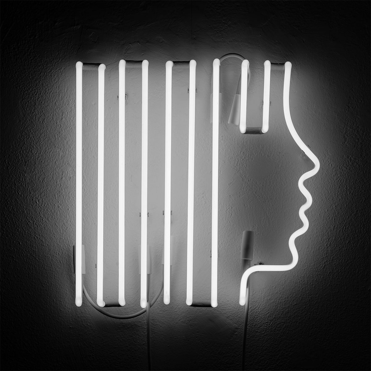 Neon artwork of half a face
