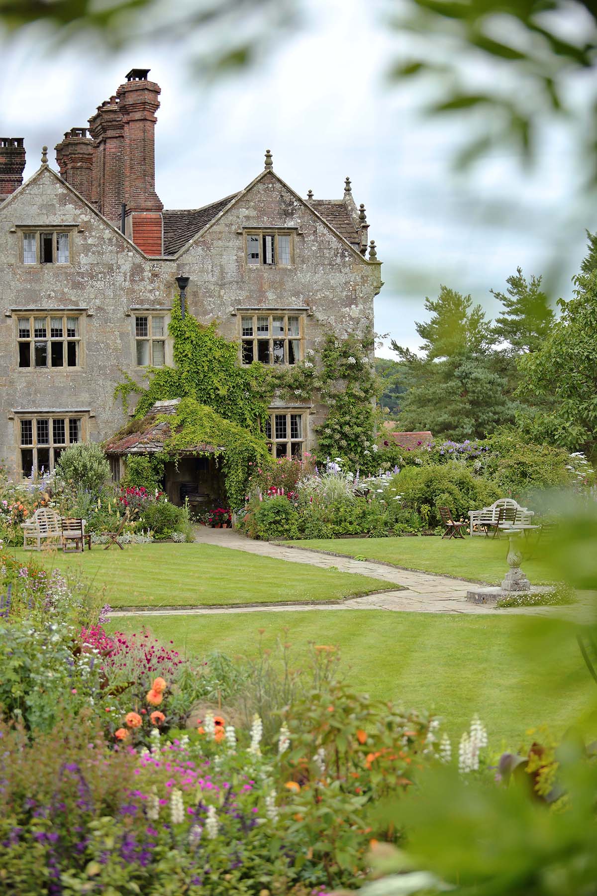 country estate house with lush gardens