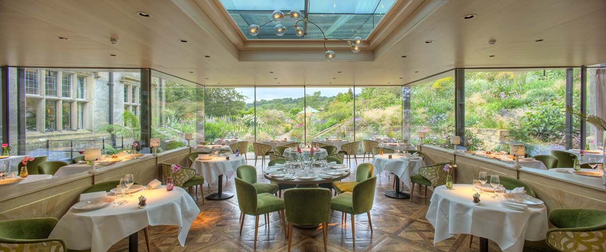 Luxurious contemporary style dining room with glass walls