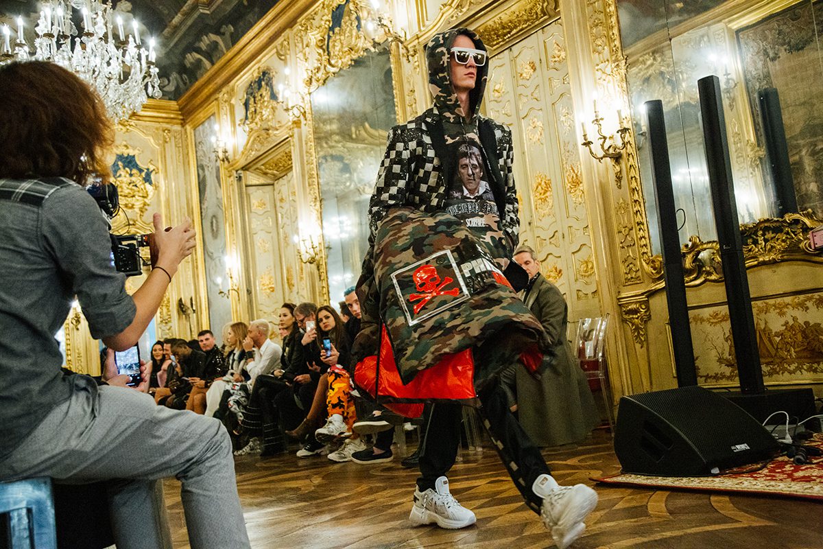 Model walking on catwalk