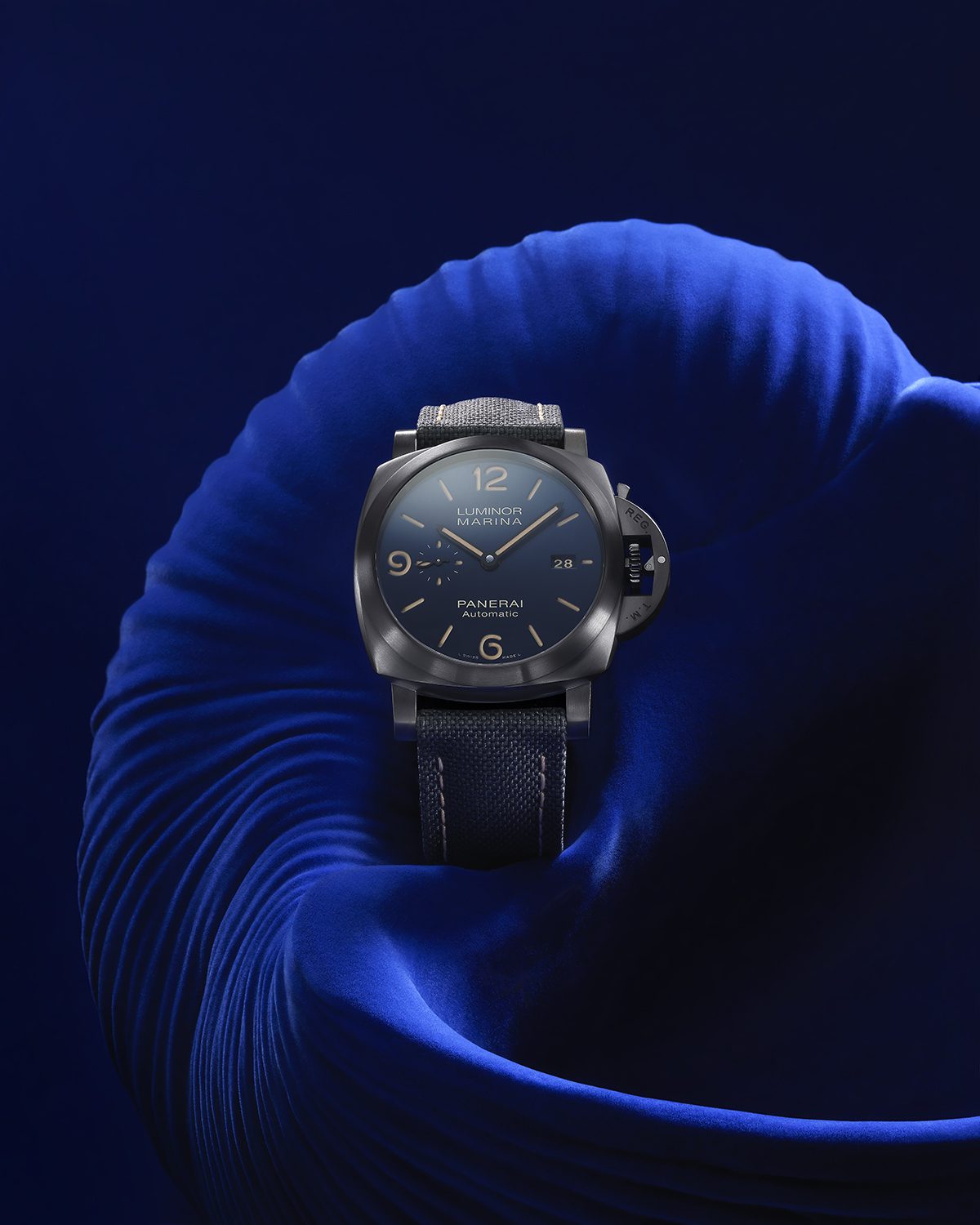 luxurious timepiece pictured against a dark blue background