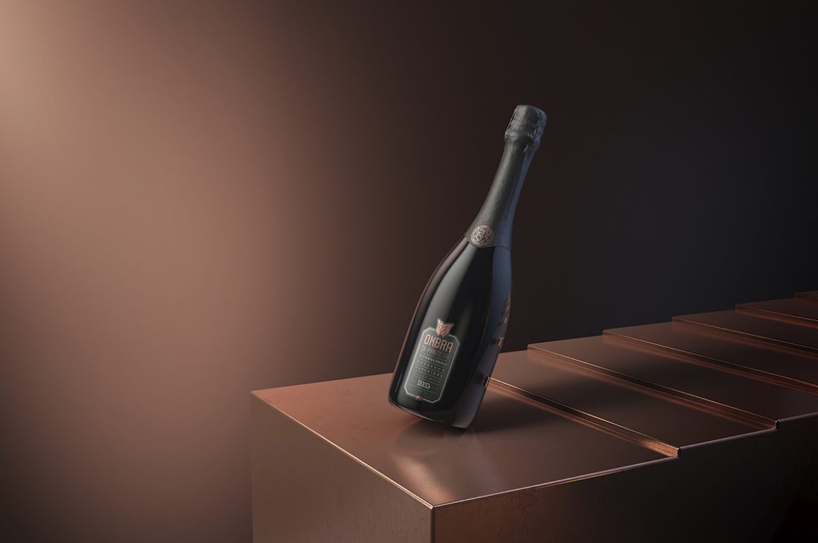 Prosecco bottle against brown background