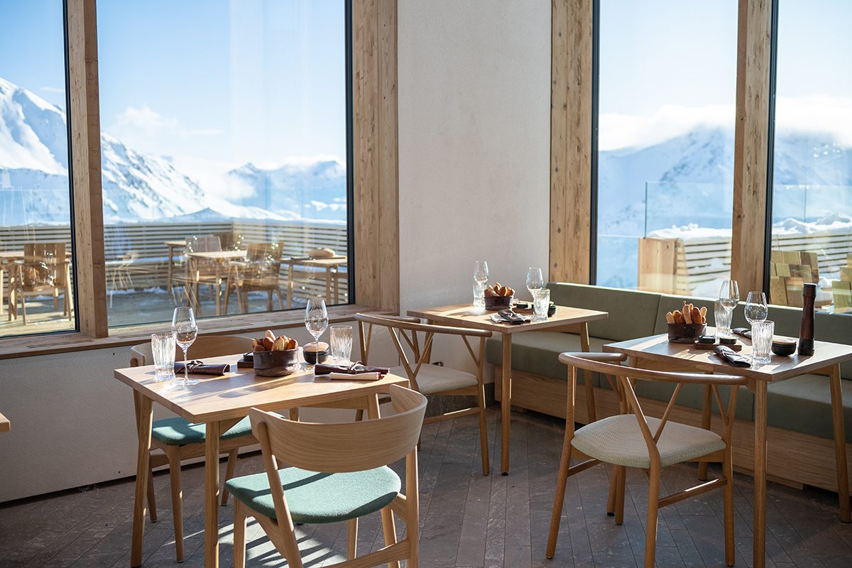 Alpine restaurant with tables laid for lunch