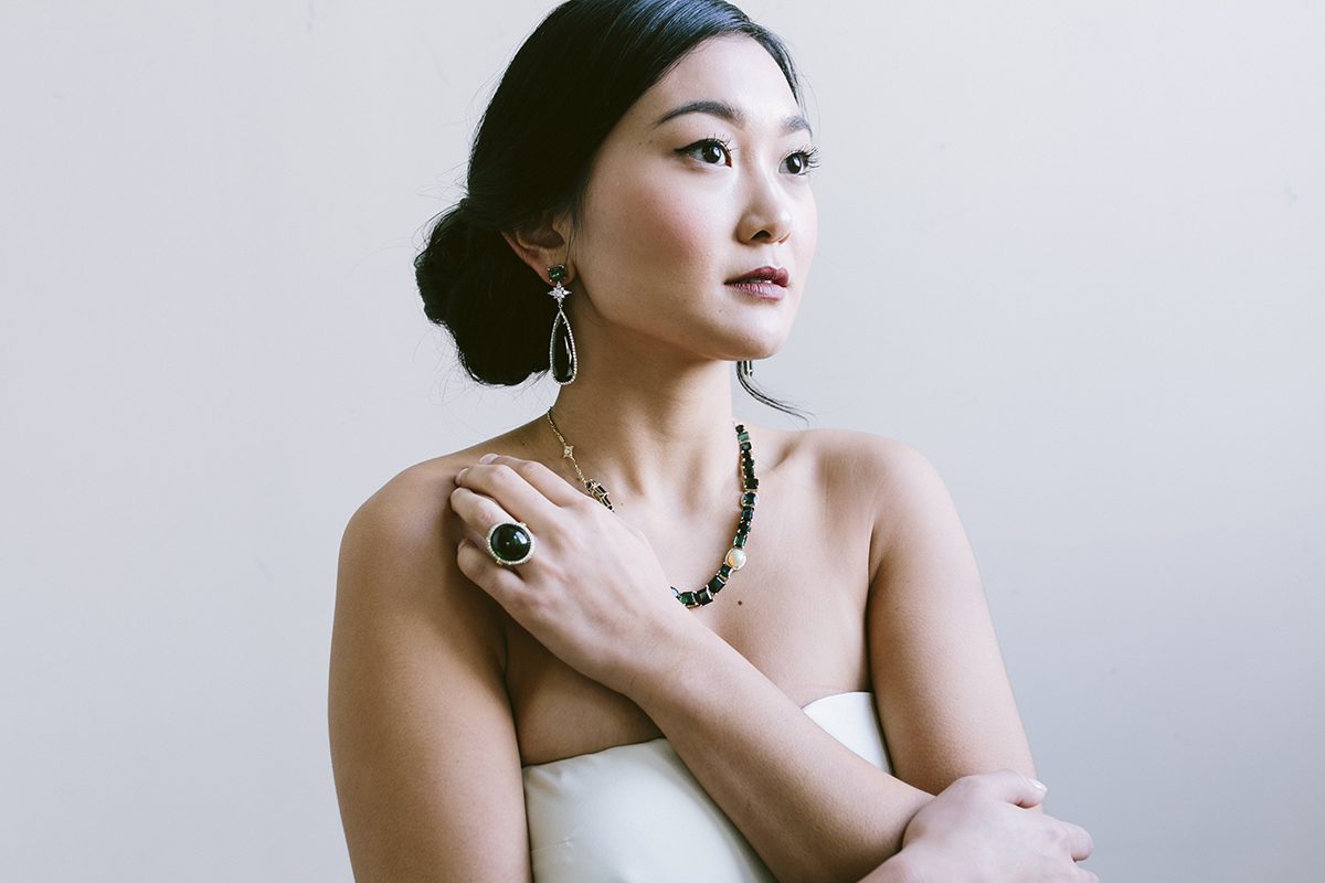 Model wearing fine jewellery pieces