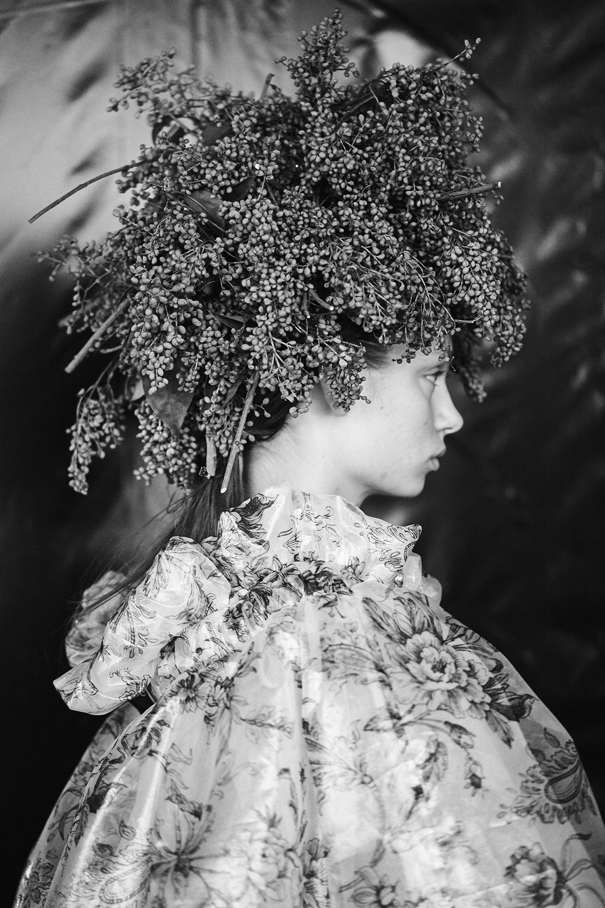 Model wearing flower headpiece