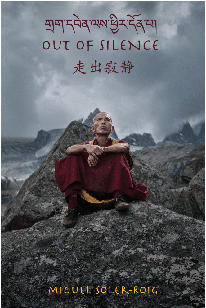 Monk sitting on a rock