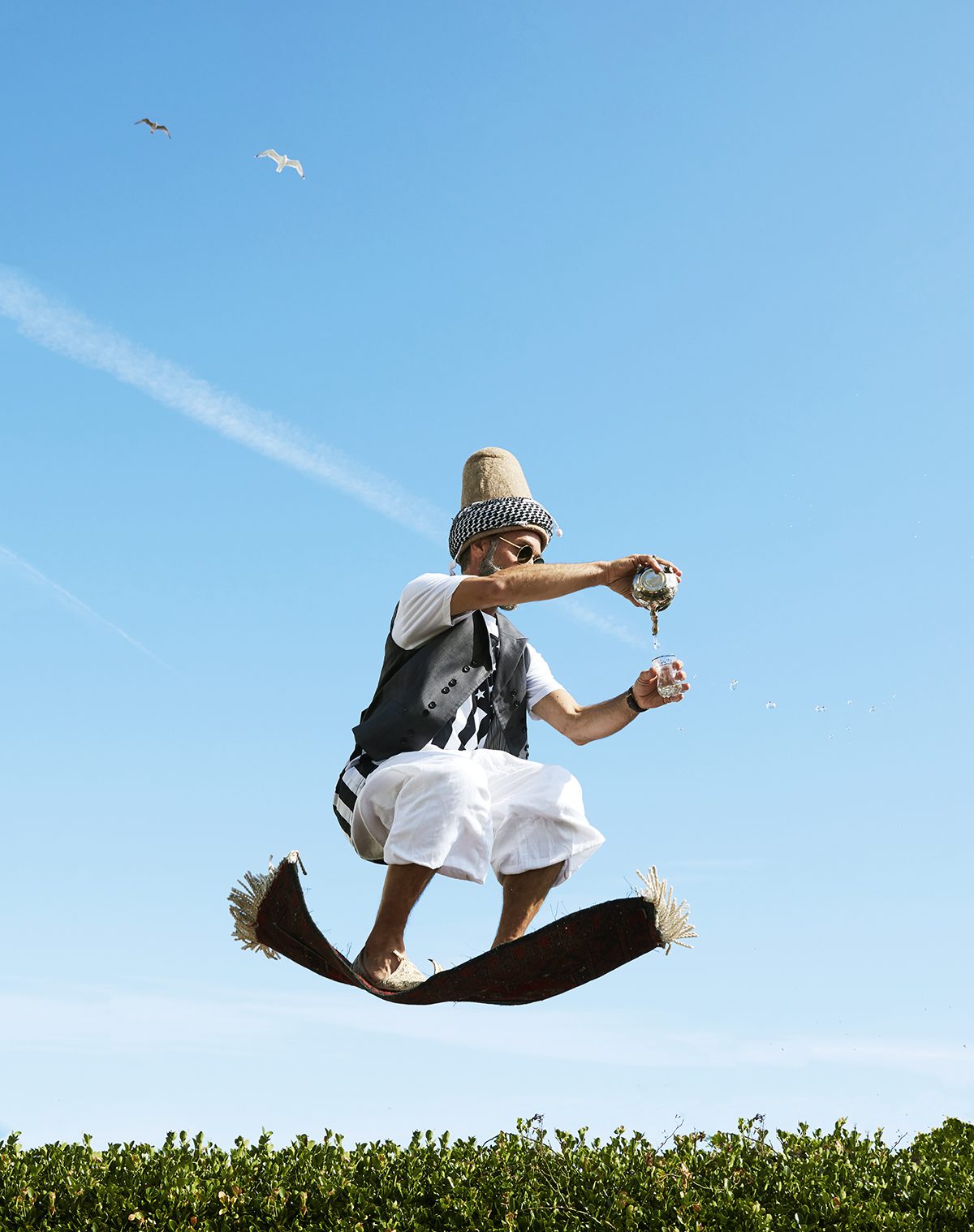Man floating on a rug 