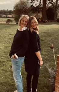 two women in a garden