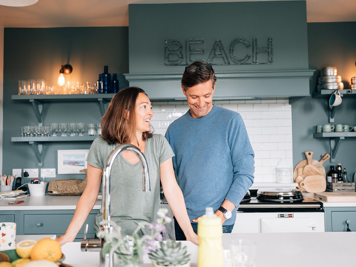 man and wife in the kitchen