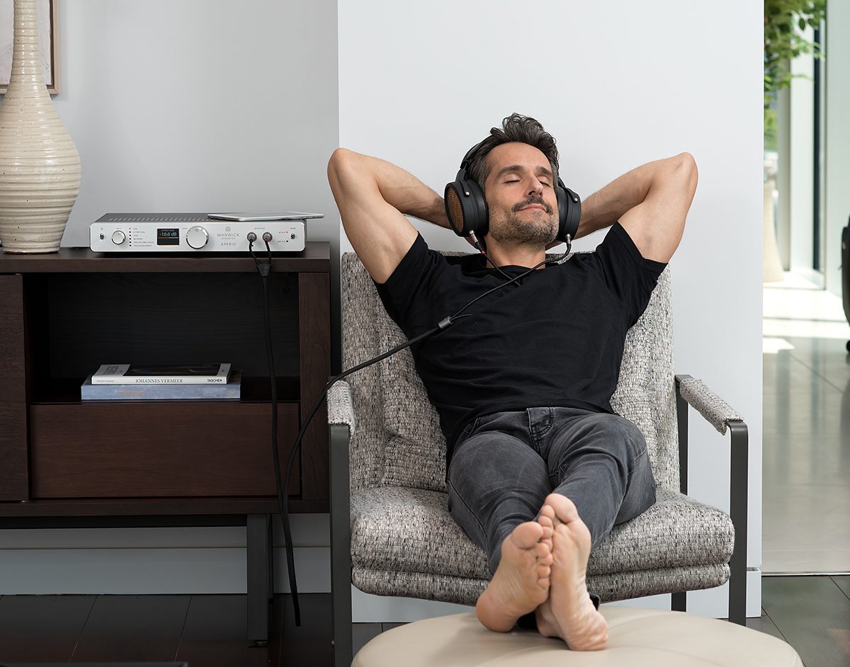 man listening to music with headphones