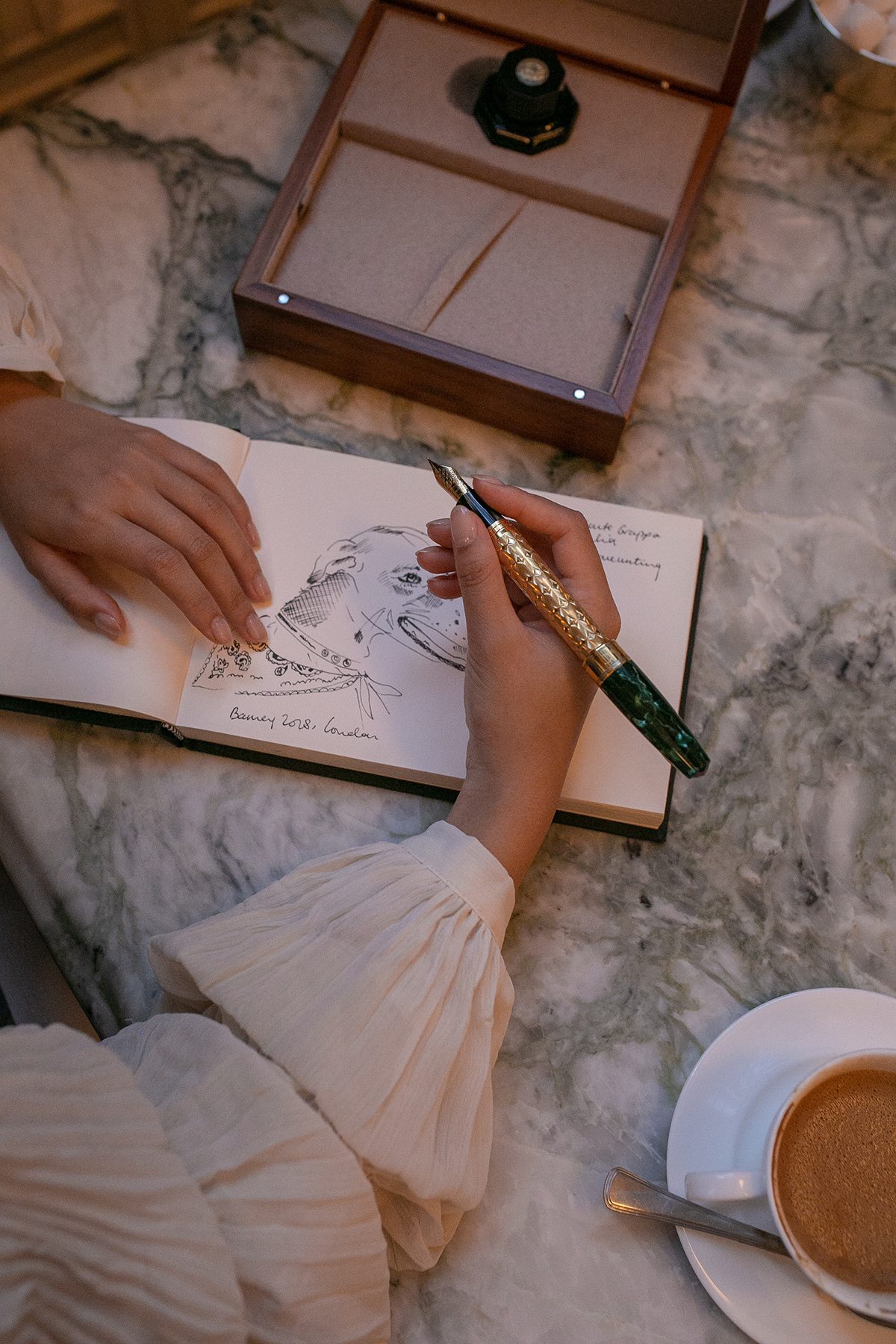 woman with a fountain pen