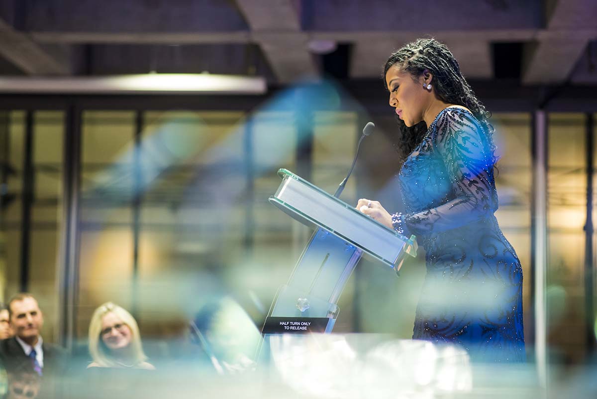 woman speaking at conference
