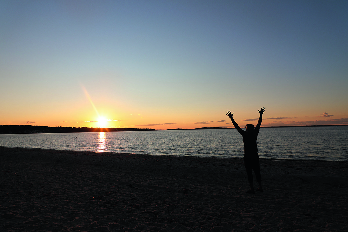 man on the beach at sunset