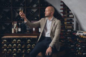 man in whisky cellar