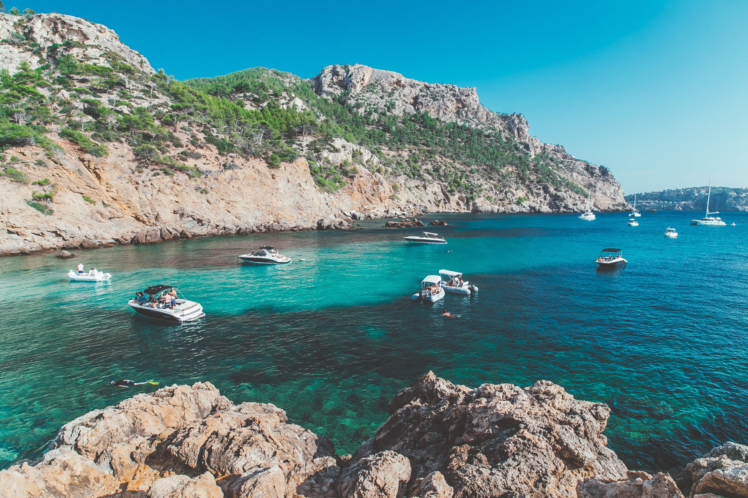 boats floating in a cove