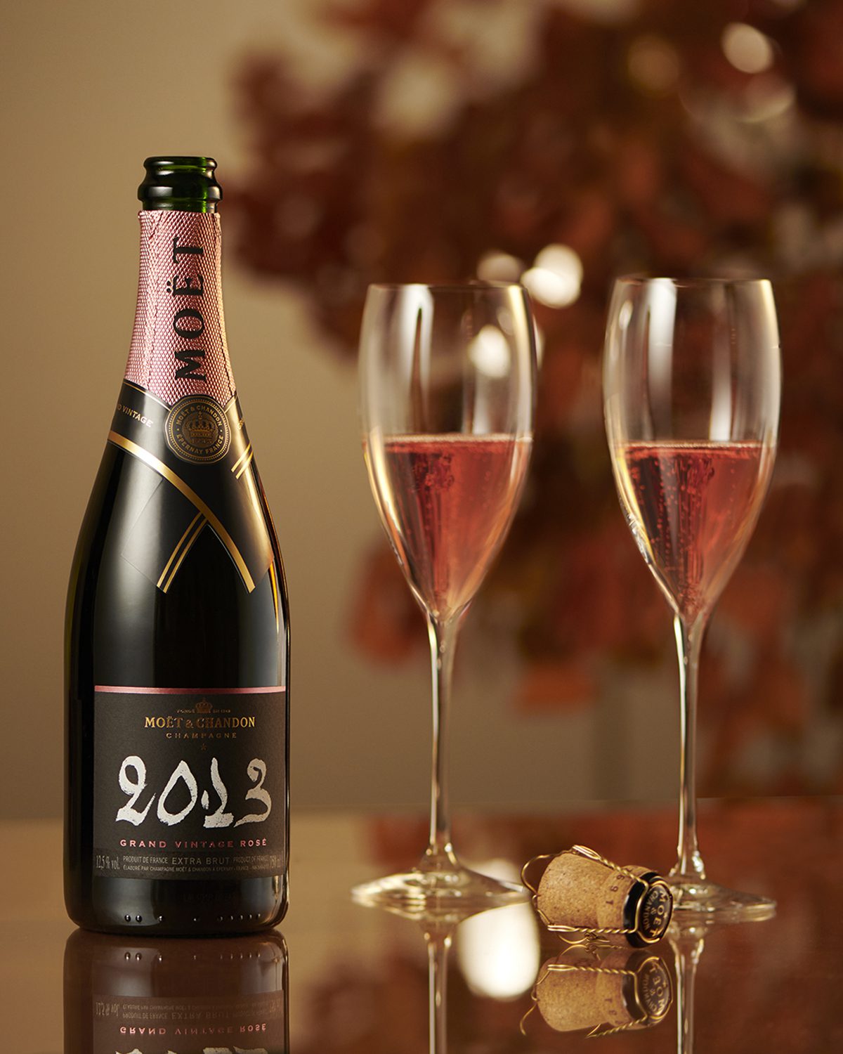 champagne bottle with two glasses