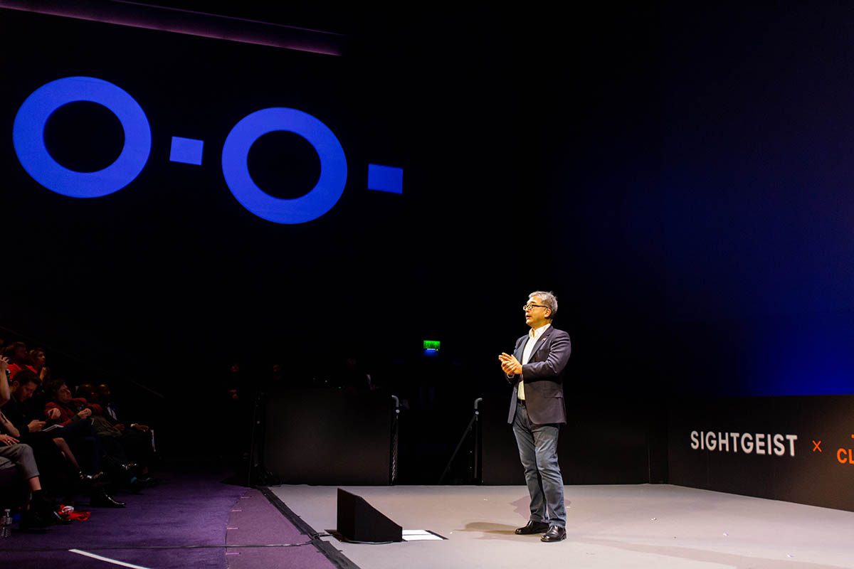 James Chen giving a speech