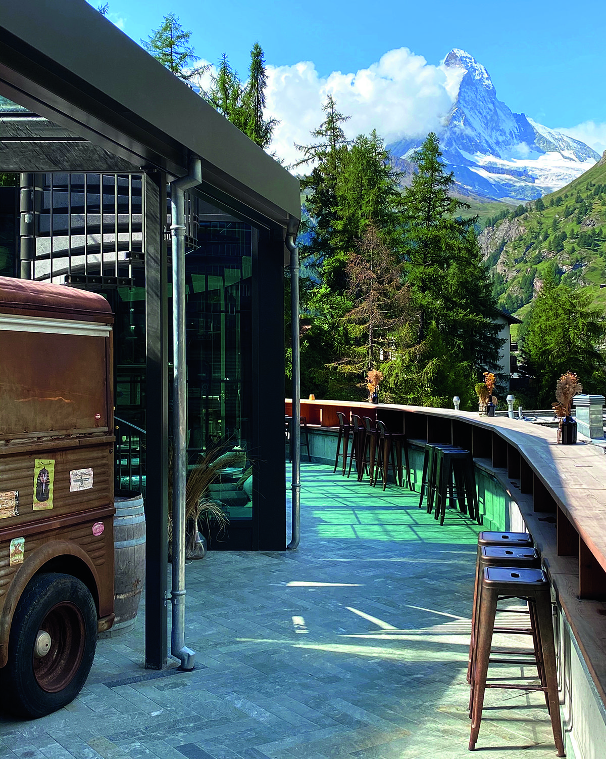 hotel bar with mountains in the distance