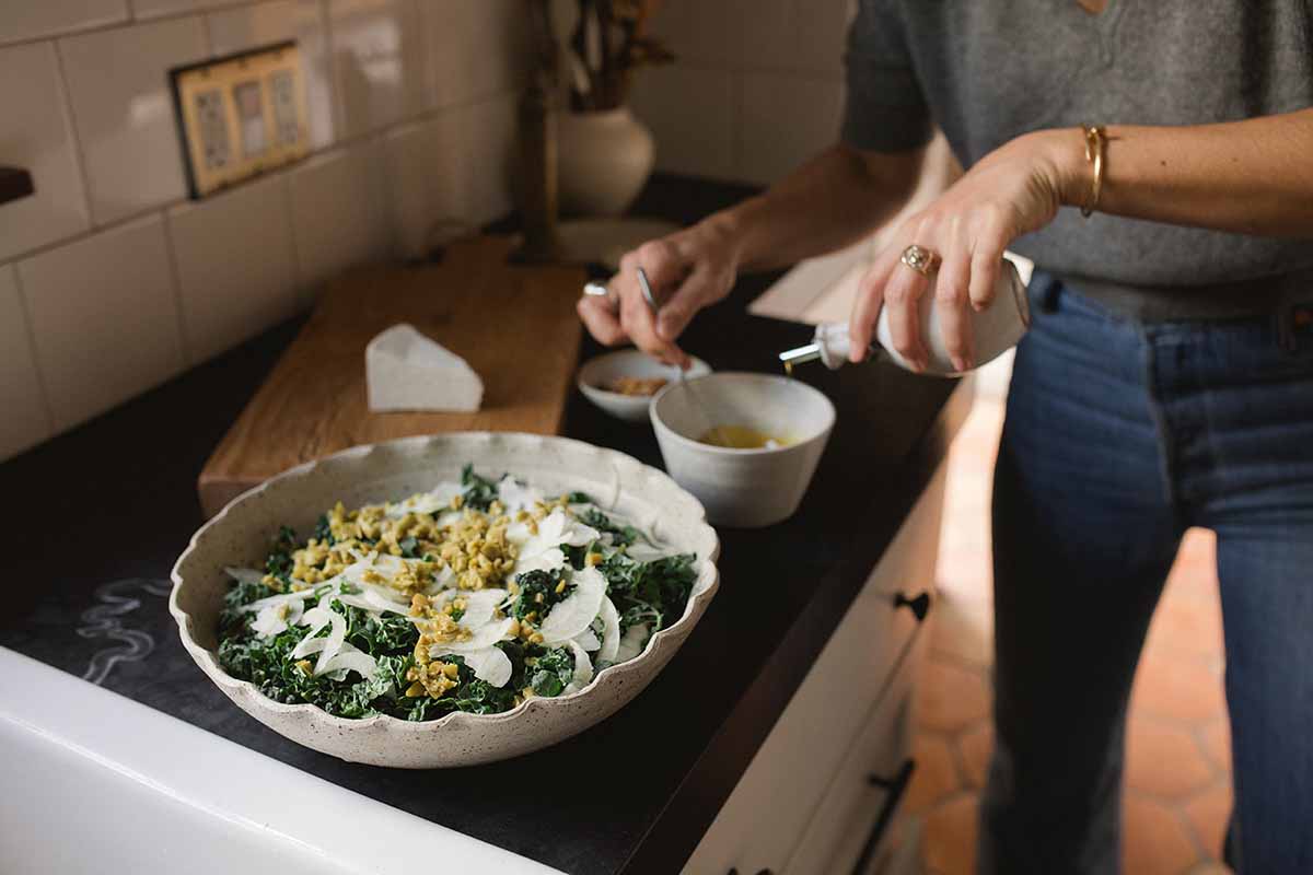 woman preparing a salad