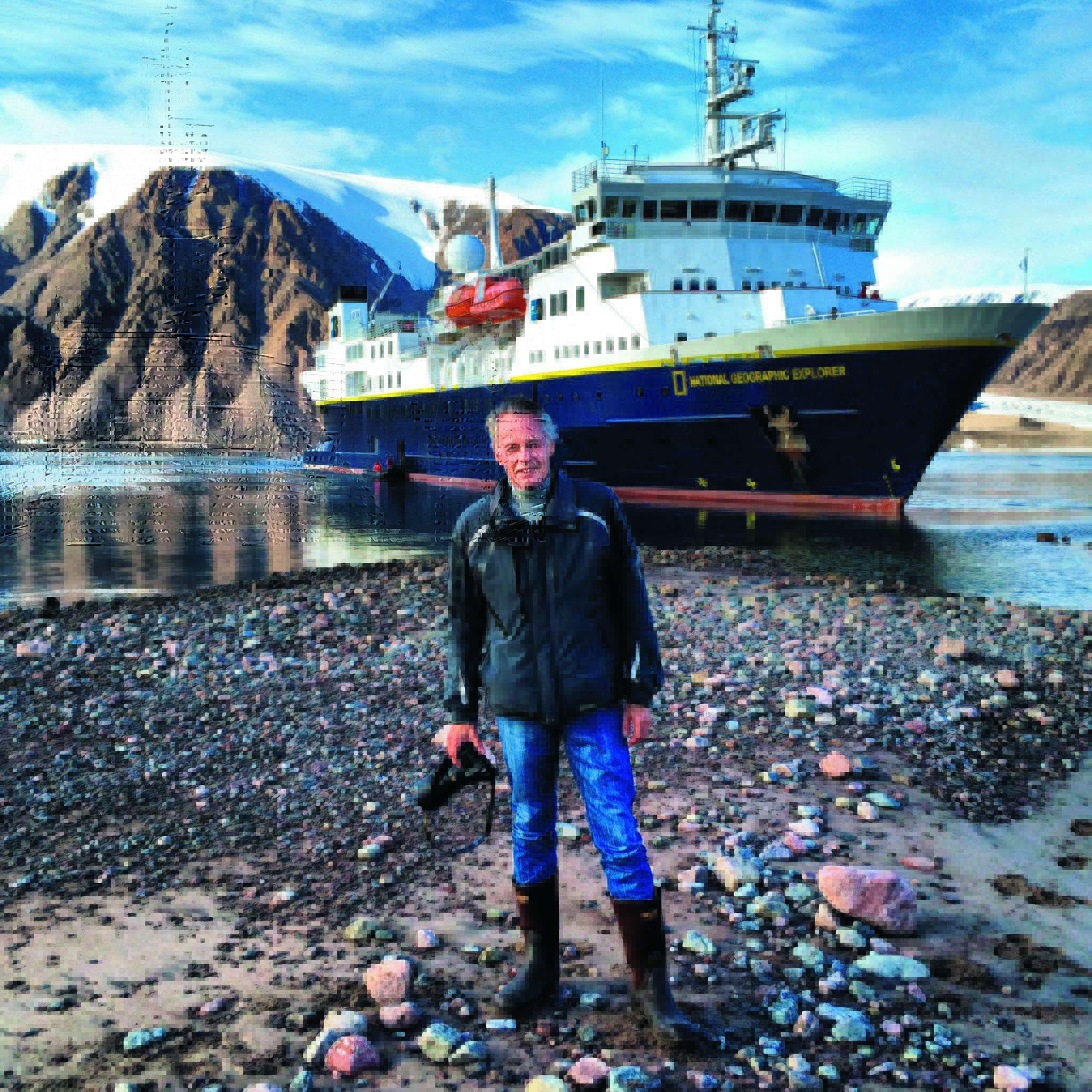 man standing on the sea shore