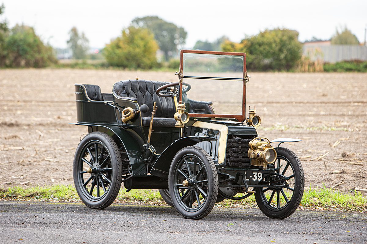 an old style black car