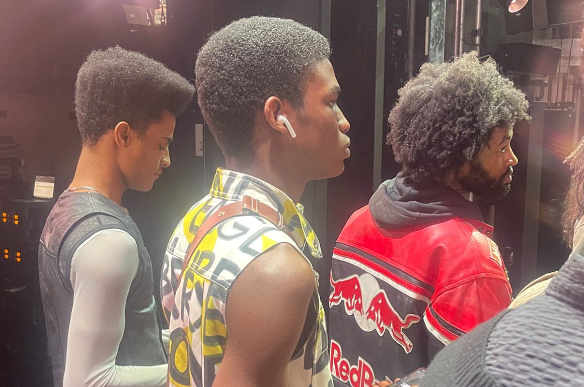 models waiting to go on the catwalk