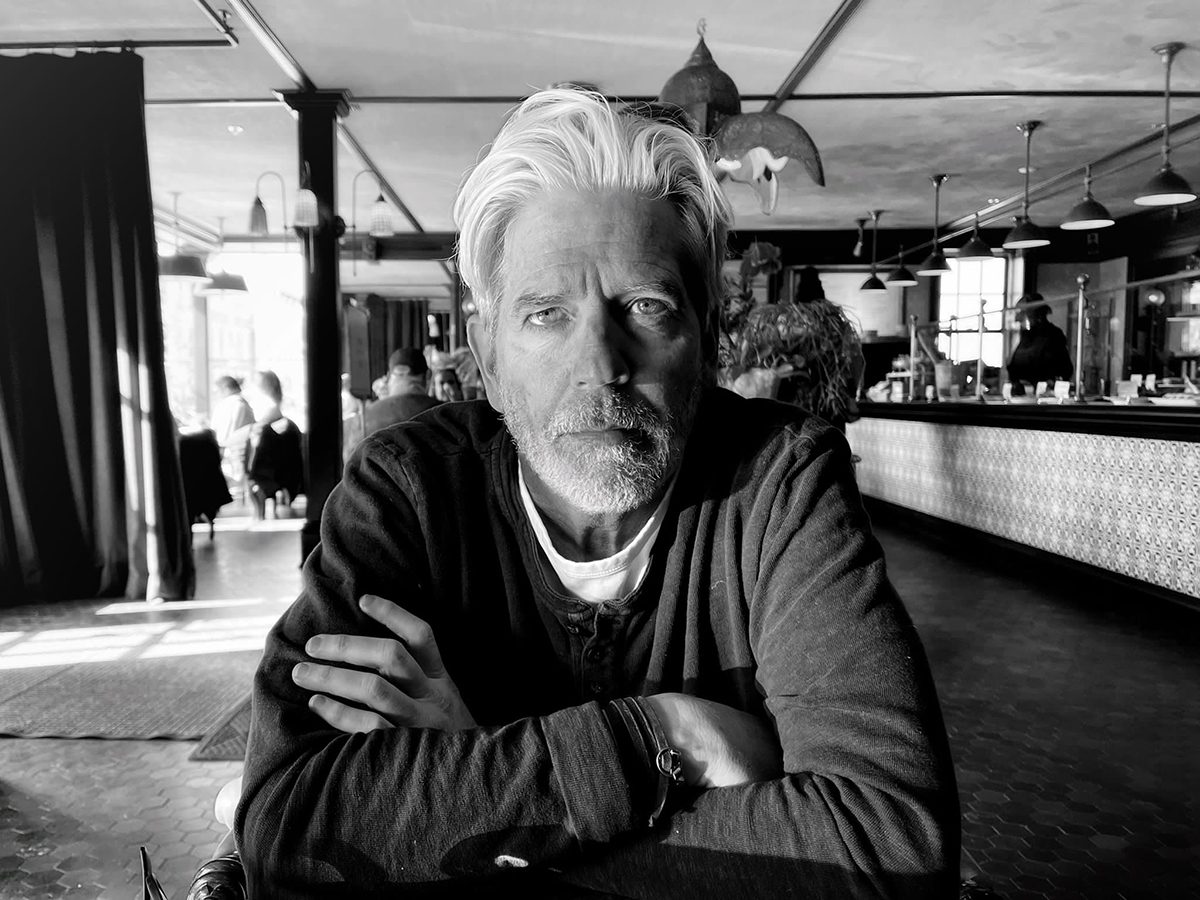 a man with his arms folded