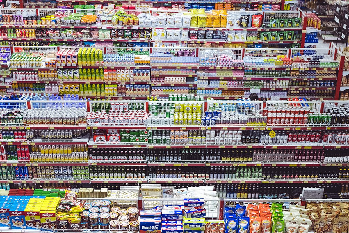 consumer goods stacked on shelves in a supermarket