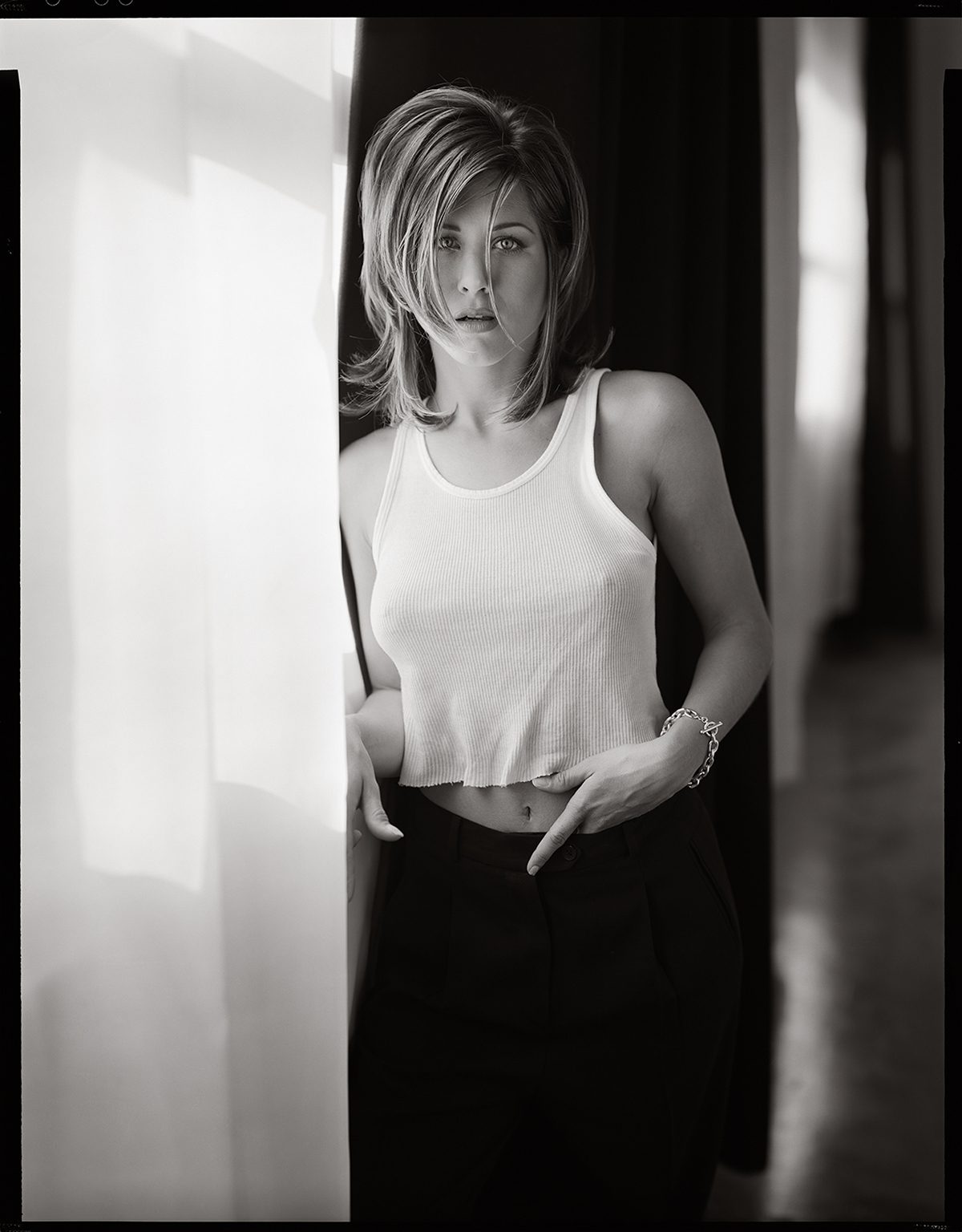 Jennifer Aniston in a white vest