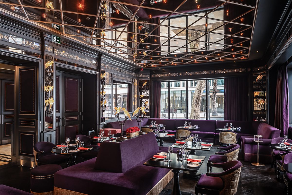 Purple velvet couches in a restuarant