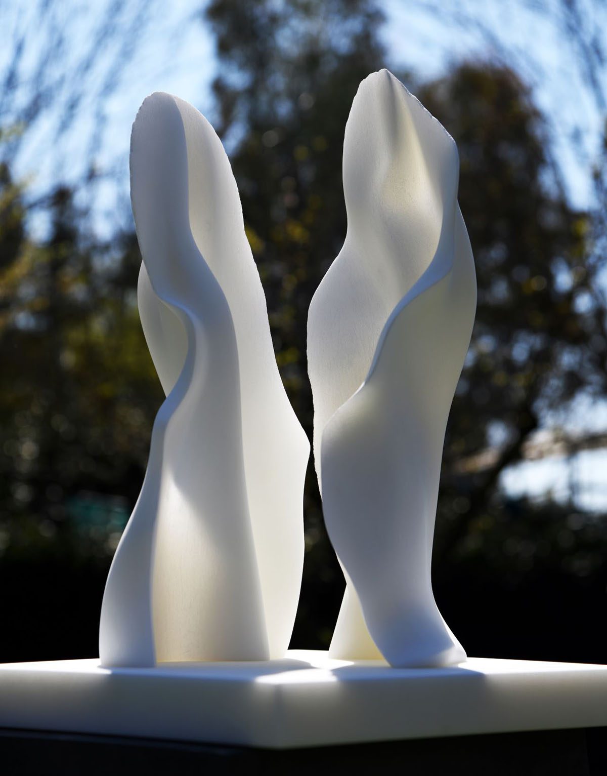 Two pieces of marble on a stand outside