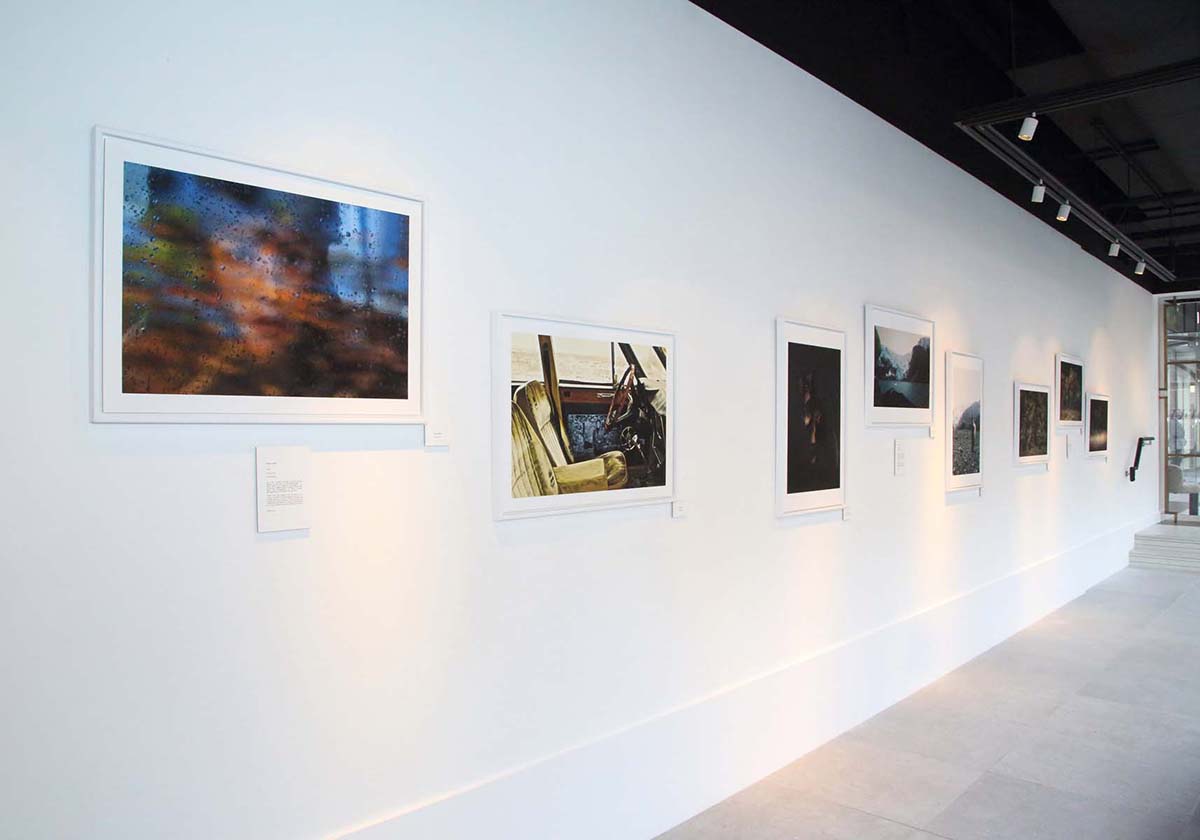 colourful photographs on a white wall