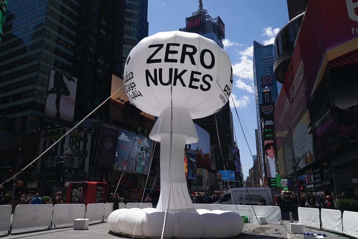 An inflatable white structure that says 'Zero Nukes' in Times Square