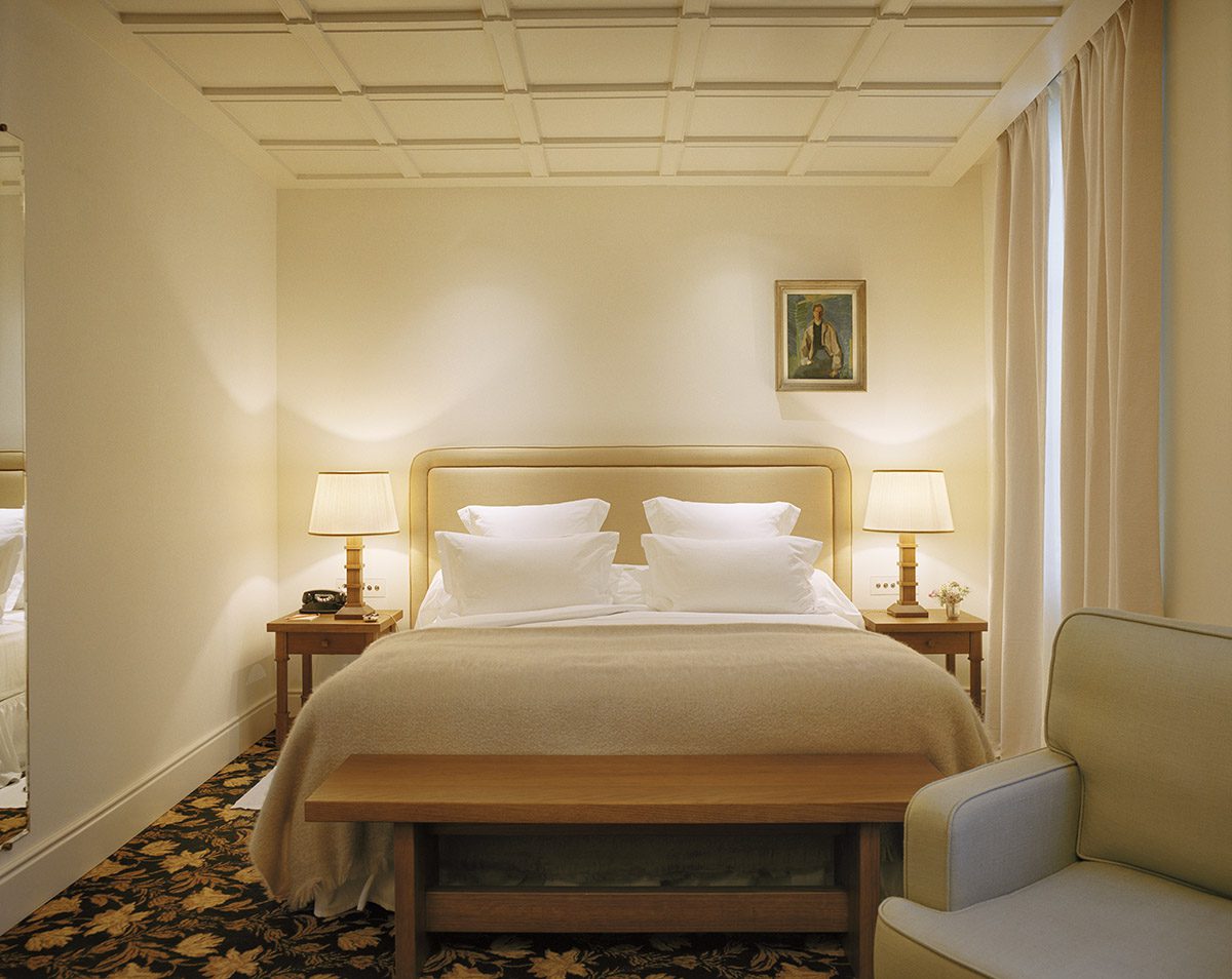 a cream and white bedroom