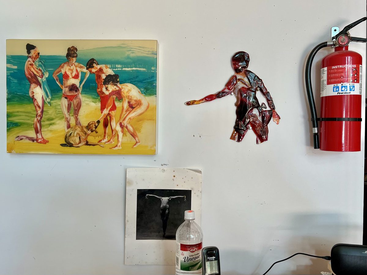 paintings hung up on a wall