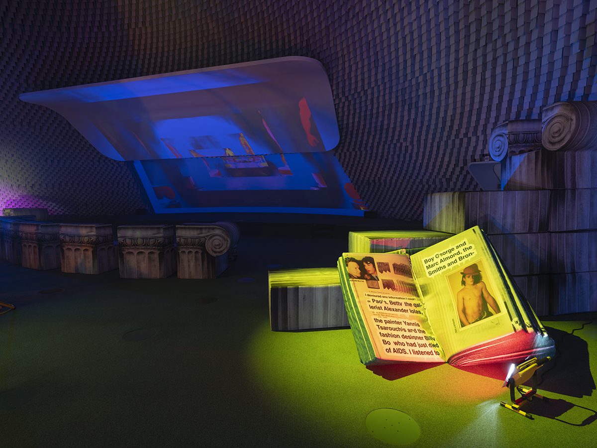 a large book with a yellow light on it