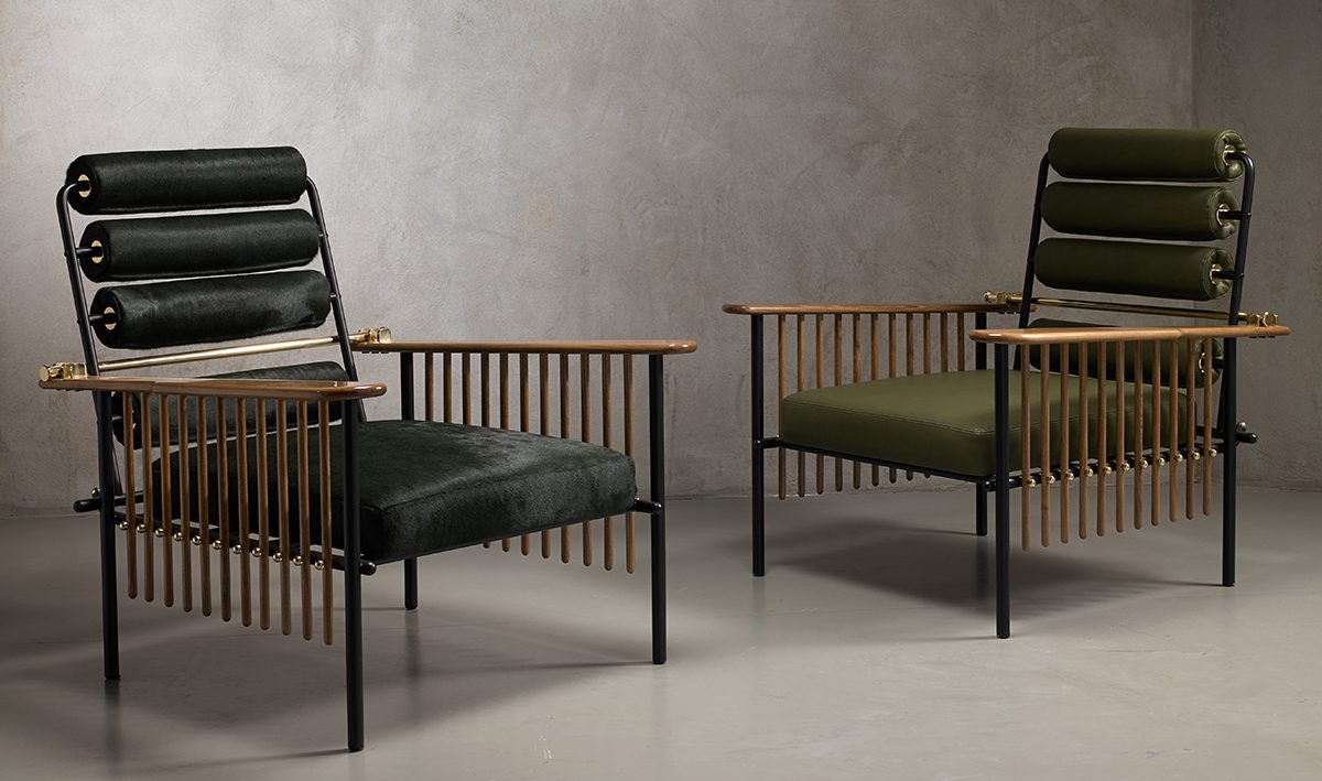 green cushioned chairs with bronze metal