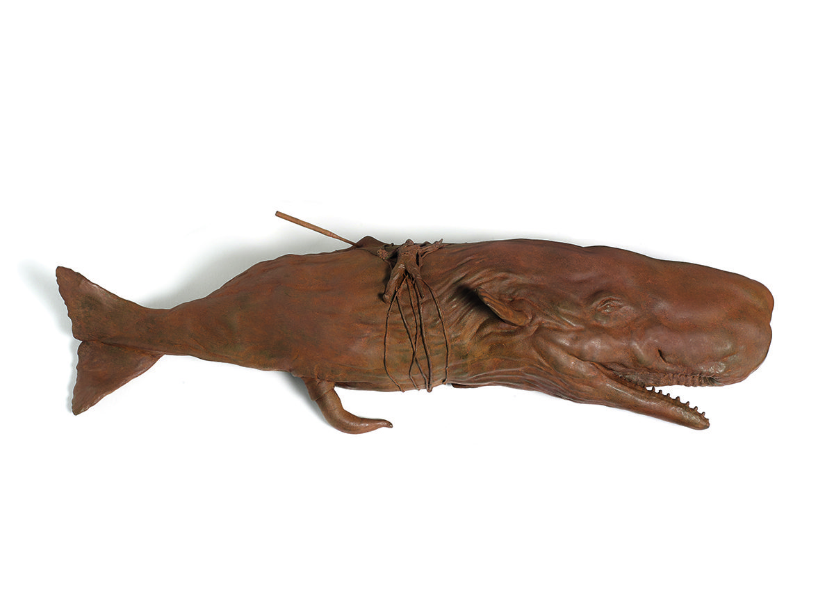 A whale sculpture in brown