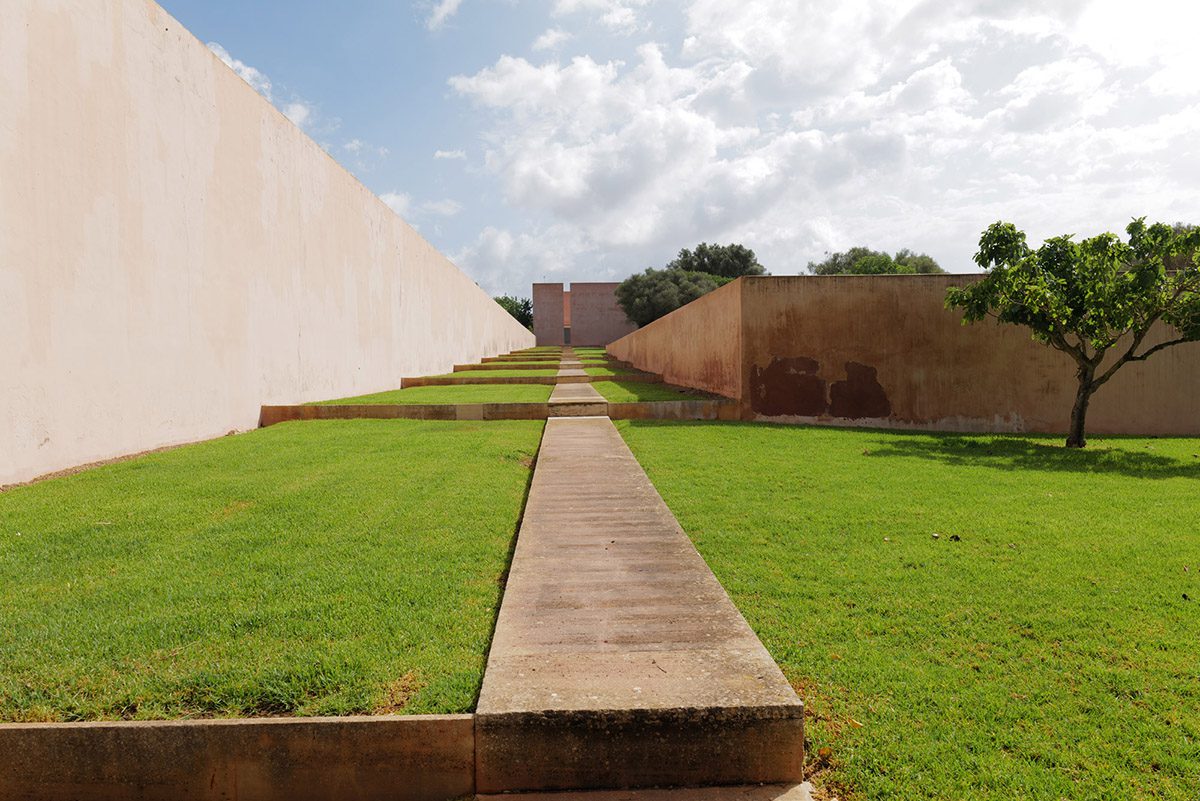 green grass on either side of a path
