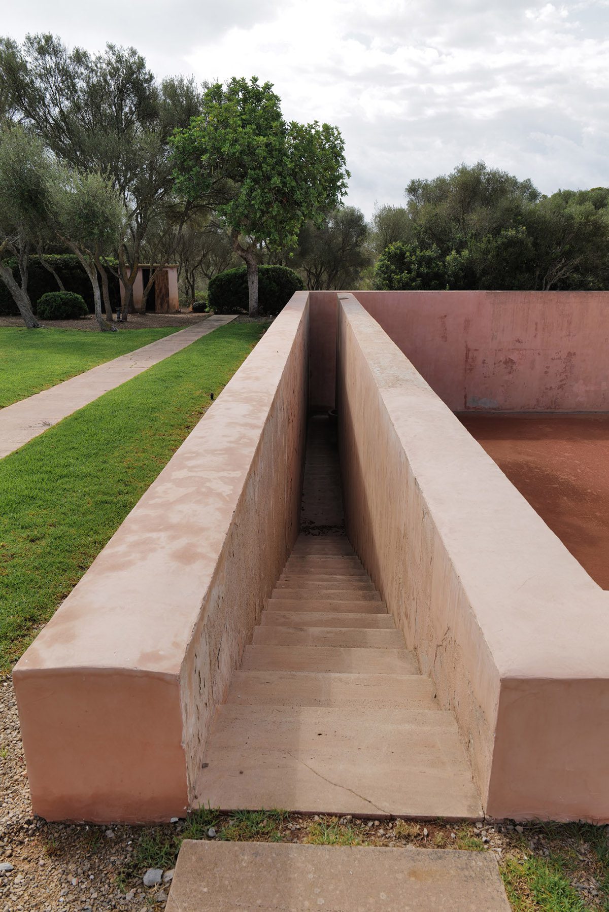 stairs in a garden leading to a basement