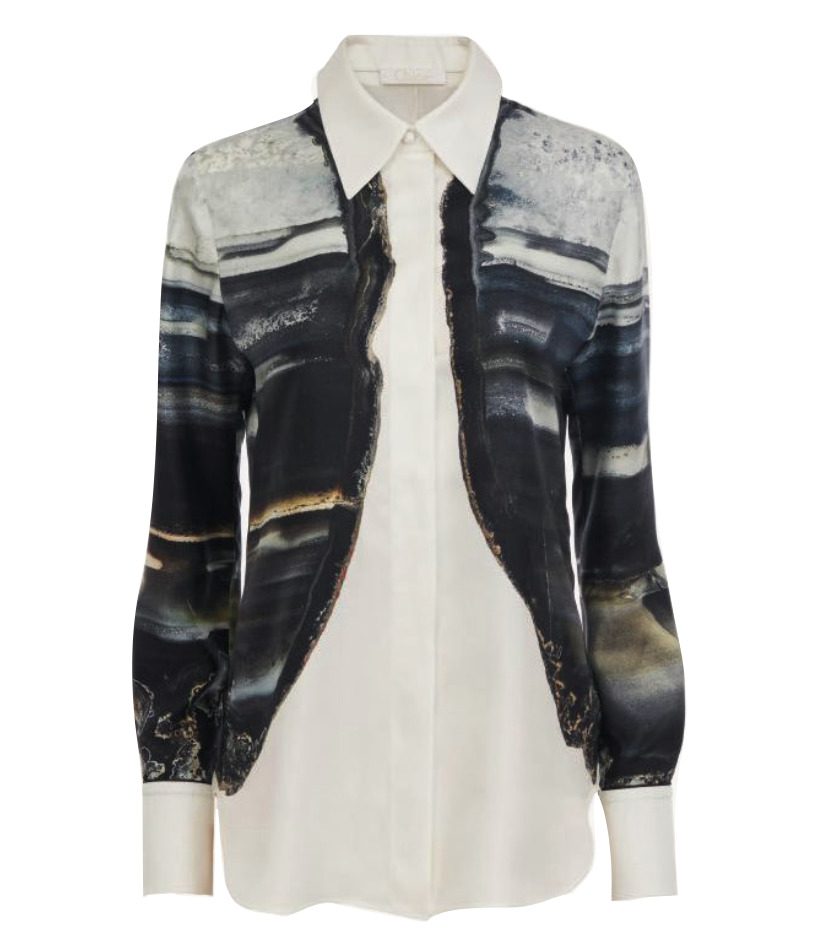 A white shirt with a dark pattern on the sleeves and sides