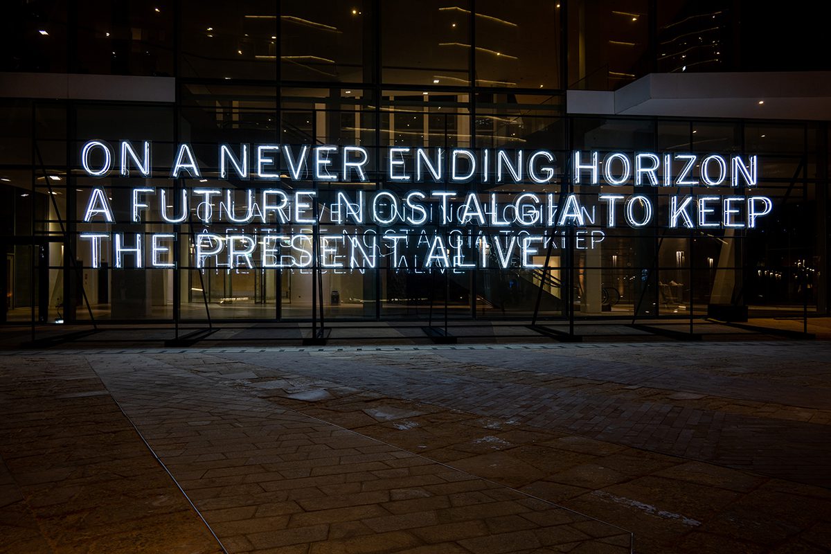 lit up sentence on a glass window